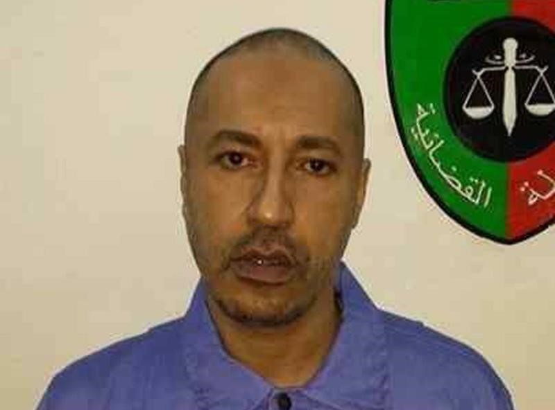 © Reuters. مثول الساعدي القذافي أمام محكمة ليبية في اتهامات بالقتل
