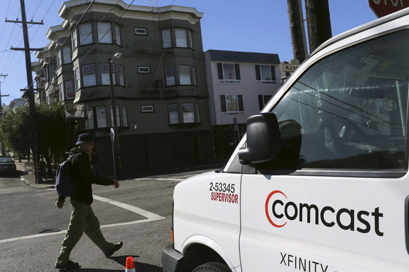 © Reuters. File photo of a Comcast sign on the side of a vehicle in San Francisco