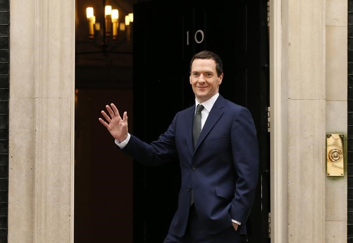 © Reuters. George Osborne arrives at 10 Downing Street as Britain's Prime Minister David Cameron begins to appoint his cabinet after securing a majority goverment, in central London