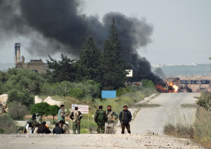 © Reuters. الجيش السوري وحزب الله يحققان تقدما كبيرا في معركة حدودية