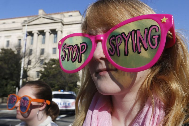 © Reuters. File photo of protester outside U.S. Justice Department in Washington