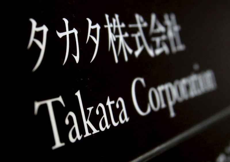 © Reuters. File photo of Takata Corp's company plate at an entrance of the building where the Takata Corp headquarters is located in Tokyo