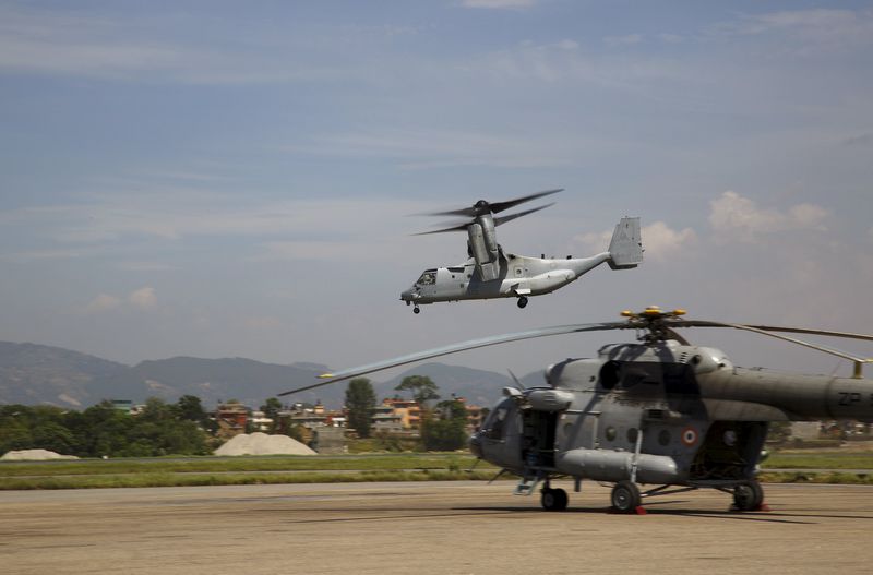 © Reuters. An Osprey aircraft takes flight during a rescue operation after the earthquake, at Tribhuvan International Airport in Kathmandu