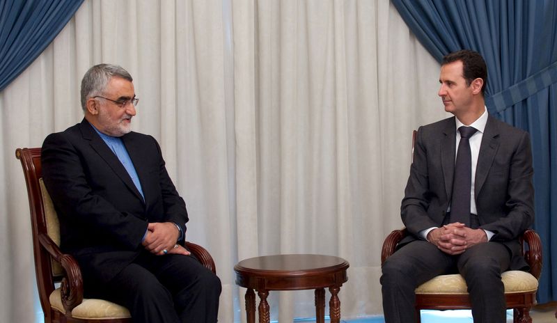 © Reuters. Assad meets Boroujerdi in Damascus