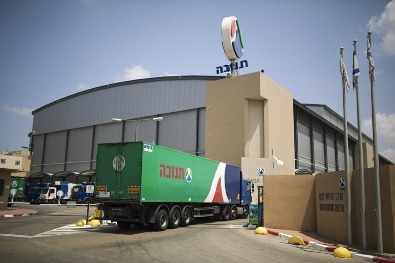 © Reuters. A Tnuva truck enters the company's logistic centre in Kiryat Malachi