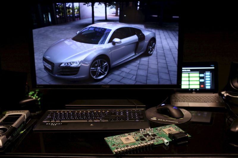 © Reuters. Electronic dashboard components are shown at a graphic display of an Audi automobile in Santa Clara