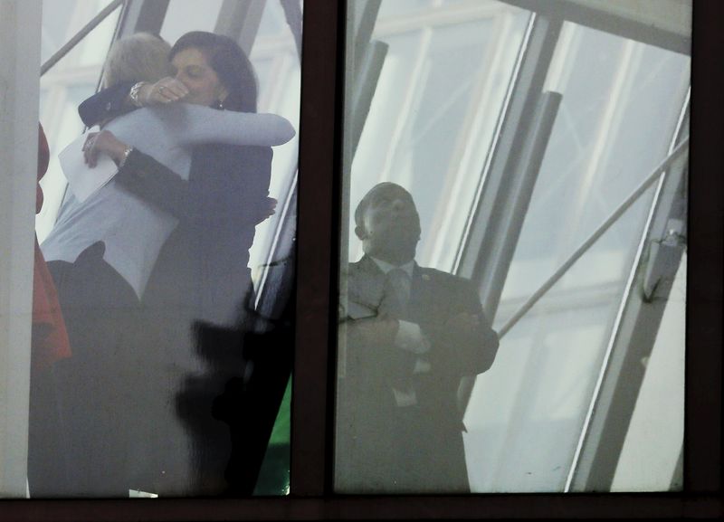 © Reuters. U.S. Attorney Carmen Ortiz gets a hug inside the federal courthouse after the sentencing of Boston Marathon bomber Dzhokhar Tsarnaev in Boston