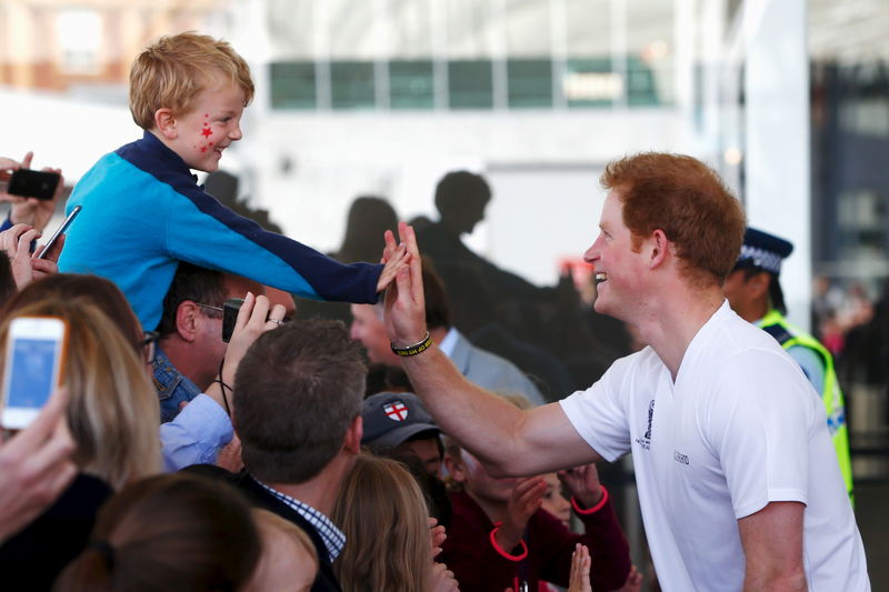 © Reuters. Britain's Prince Harry meets fans at The Cloud during a walkabout in Auckland