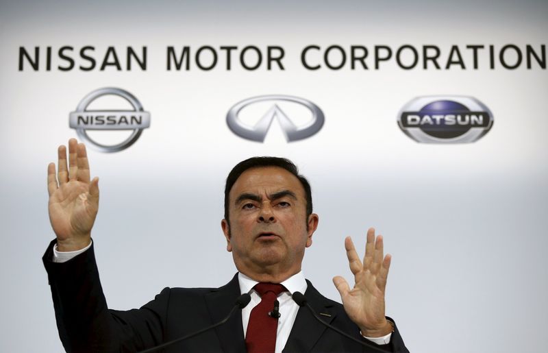 © Reuters. Ghosn speaks at a news conference in Yokohama