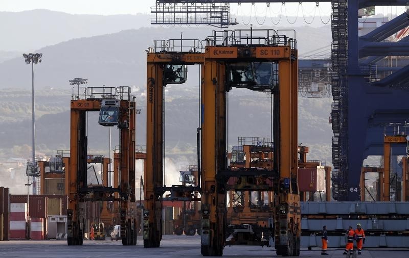 © Reuters. Container cranes are seen at Italy's biggest port Gioia Tauro in the southern Italian region of Calabria