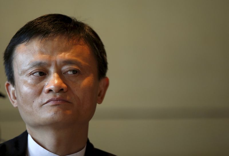 © Reuters. Alibaba founder and chairman Jack Ma listens to a reporters' question during his news conference at a hotel in Seoul