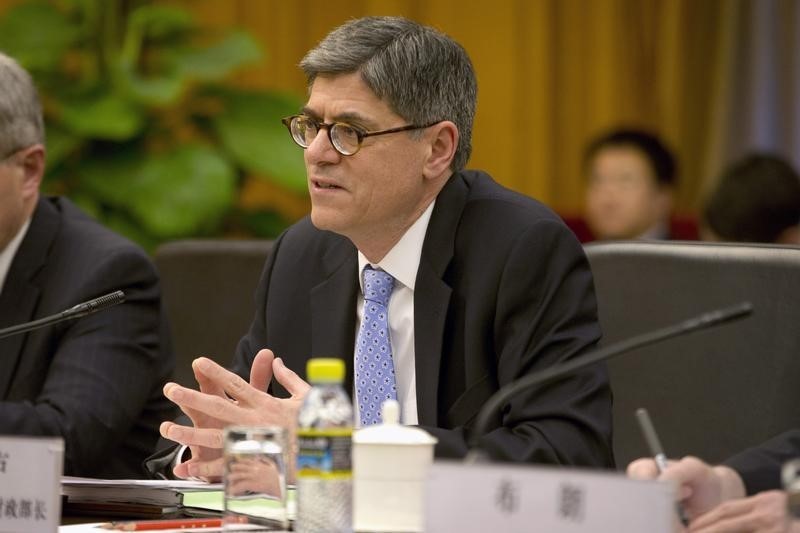 © Reuters. Lew speaks at a meeting in Beijing