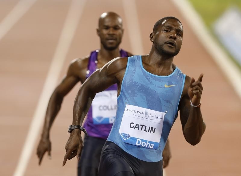 © Reuters. Gatlin from the US competes in the men's 100 meters event during the Diamond League meeting in Doha