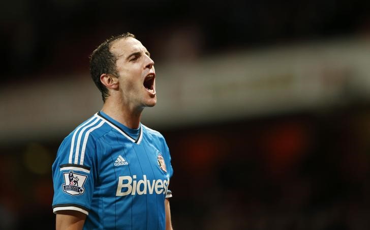 © Reuters. John O'Shea, do Sunderland, comemora empate com o Arsenal pelo Campeonato Inglês