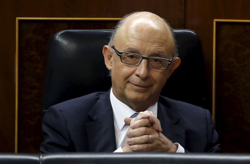 © Reuters. España coloca 5.509 mlns euros en deuda a tipos más altos 