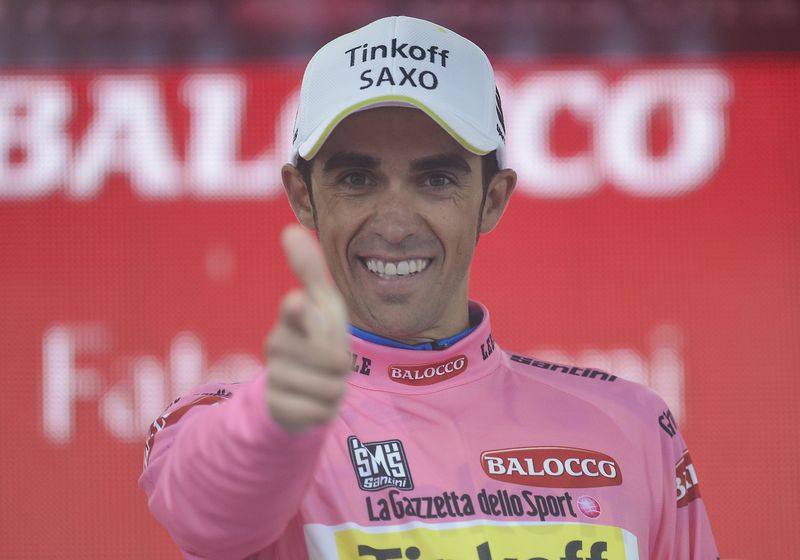 © Reuters. Contador aumenta su ventaja; Gilbert gana una etapa pasada por agua
