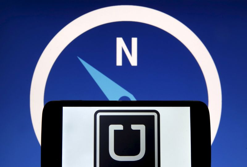 © Reuters. Photo illustration of Uber logo on a smartphone in front of a displayed logo of HERE, Nokia Oyj's map business, in Zenica