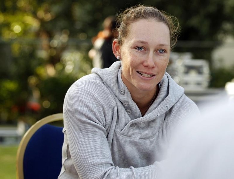© Reuters. Stosur of Australia speaks during a round-table meet on the first day of the WTA Dubai Tennis Championships