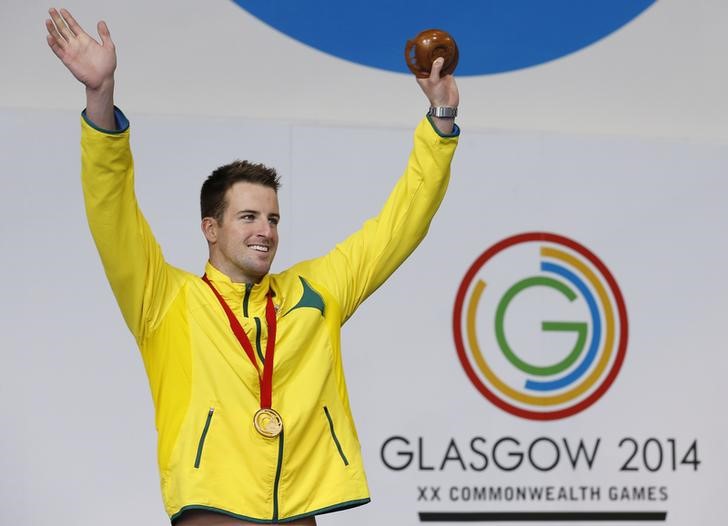 © Reuters. Australia's James Magnussen celebrates after winning the gold medal in men's 100m Freestyle final at the 2014 Commonwealth Games in Glasgow, Scotland