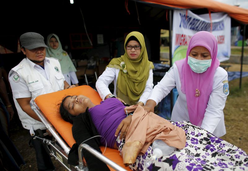 © Reuters. Malasia encuentra 139 tumbas de supuestos inmigrantes en la frontera con Tailandia
