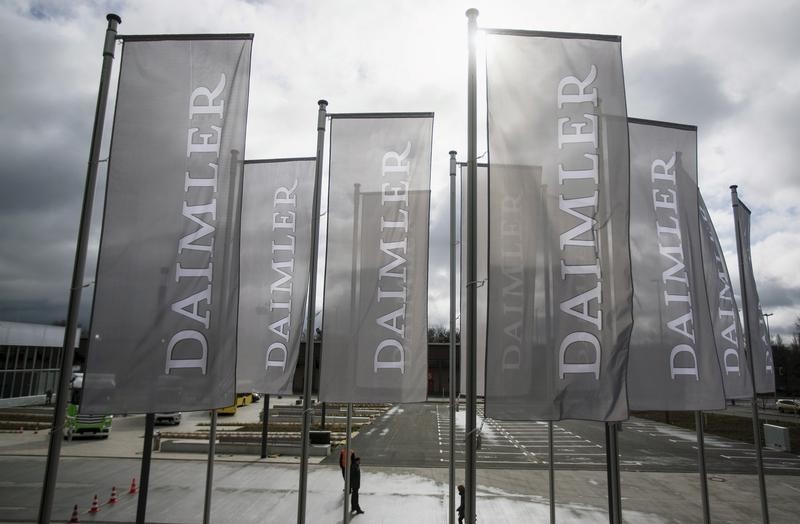 © Reuters. Daimler flags are seen at the annual shareholder meeting in Berlin