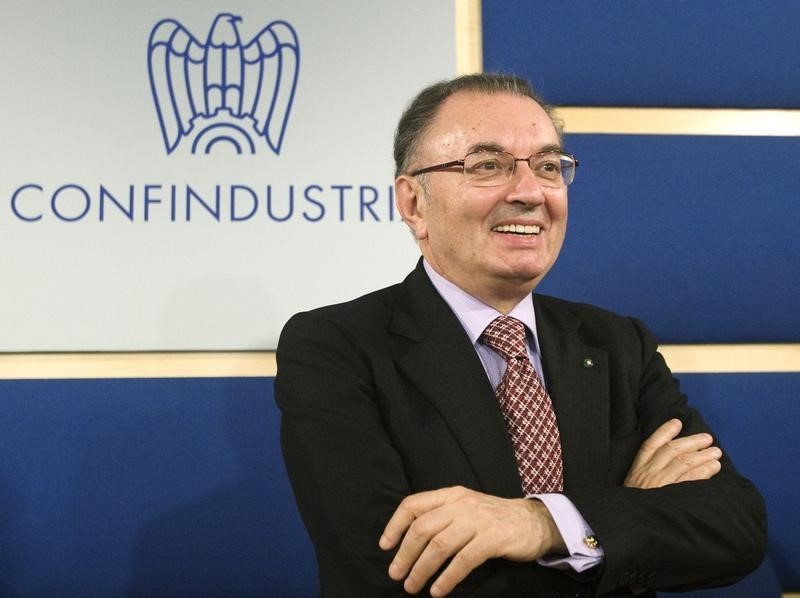 © Reuters. Giorgio Squinzi smiles as he poses for photographers after his nomination as Italy's Confidustria chairman in Rome