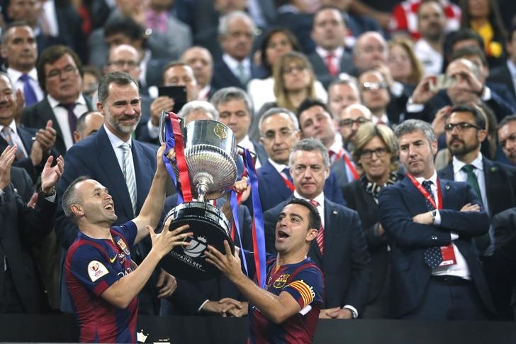 © Reuters. تشابي يطمح لتتويج رحلته مع برشلونة بالفوز بدوري الأبطال
