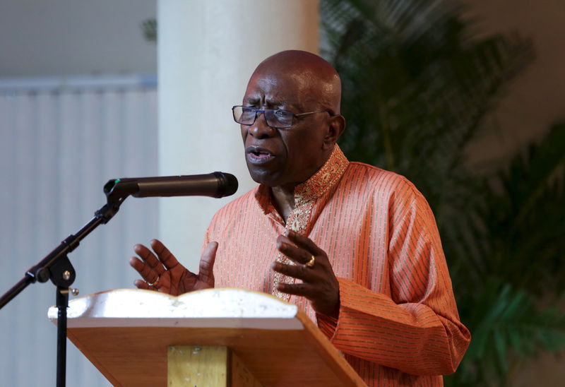 © Reuters. Former FIFA Vice President Warner addresses the audience during a ceremony in celebration of Indian Arrival Day organized by his political Independent Liberal Party in Chaguanas