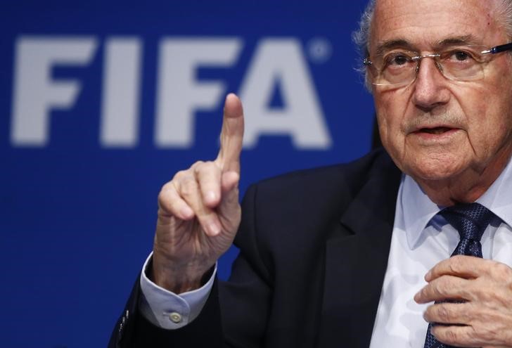 © Reuters. Re-elected FIFA President Blatter gestures during a news conference after an extraordinary Executive Committee meeting in Zurich