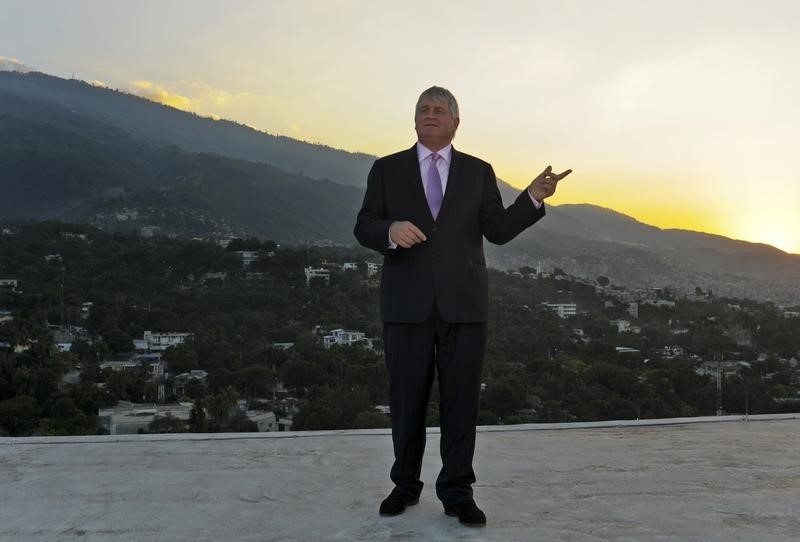 © Reuters. Digicel Chairman Denis O'Brien poses on the rooftop of his company's headquarters in Port-au-Prince