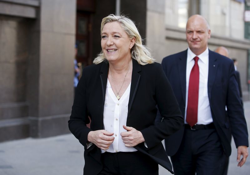 © Reuters. Marine Le Pen leaves the building of parliament in Moscow