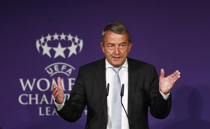 © Reuters. Niersbach, president of the German Football Association, speaks during the official handover ceremony of the UEFA Champions League trophy in Berlin