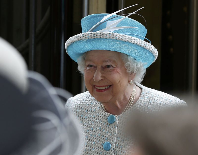 © Reuters. Britain's Queen Elizabeth smiles as she arrives at Lancaster railway station in Lancaster