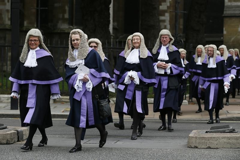 © Reuters. Judges walk from Westminster Abbey to the Houses of Parliament after a service to mark the start of the legal year in central London