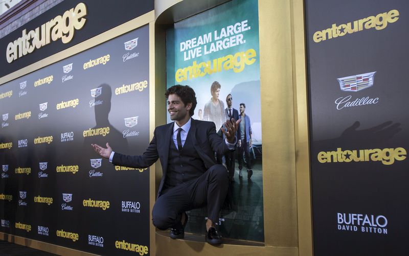 © Reuters. Cast member Grenier poses at the premiere of "Entourage" at the Regency Village theatre in Los Angeles