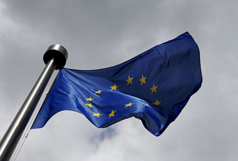 © Reuters. An European Union flag flutters outside outside the EU Commission headquarters in Brussels