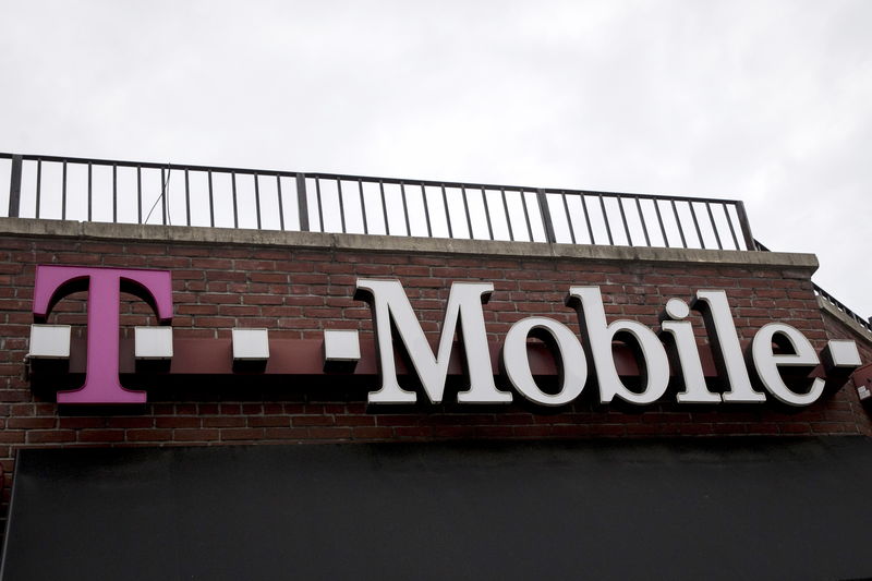 © Reuters. A T-Mobile store sign is seen in the Brooklyn borough of New York