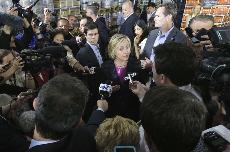 © Reuters. Democratic presidential candidate Clinton talks to the media after a campaign appearance at Smuttynose Brewery in Hampton