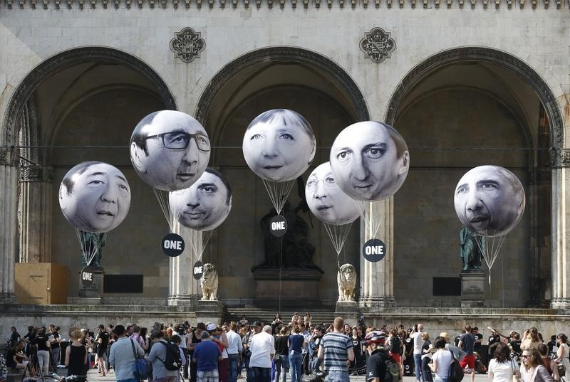 © Reuters. Balloons made by the 'ONE' campaigning organisation depicting leaders of the countries members of the G7 are pictured in Munich