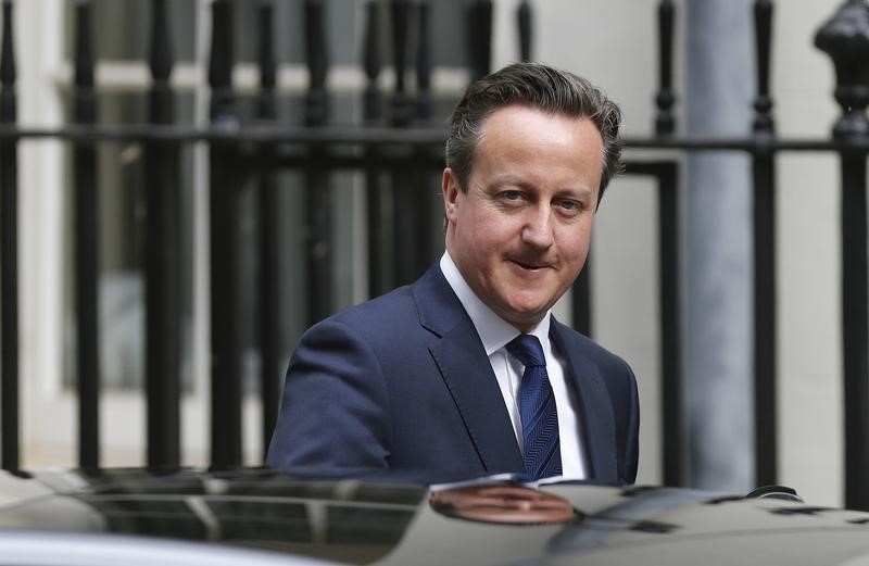 © Reuters. Britain's Prime Minister David Cameron leaves Number 10 Downing Street to attend Prime Minister's Question Time in Parliament