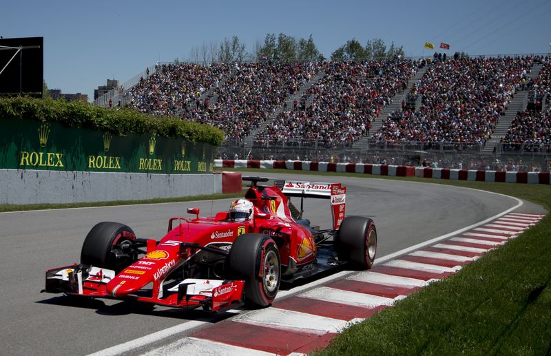 © Reuters. Ferrari Formula One driver Sebastian Vettel of Germany drives his car during the qualifying session of the Canadian F1 Grand Prix at the Circuit Gilles Villeneuve in Montreal