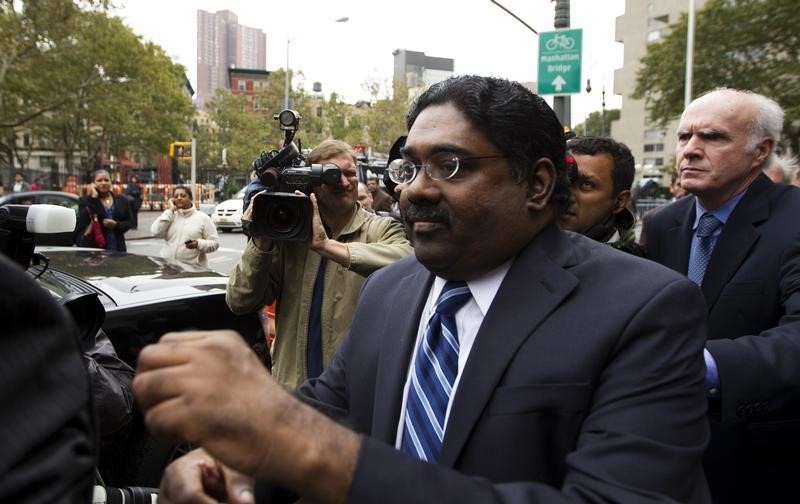 © Reuters. Galleon hedge fund founder Raj Rajaratnam departs Manhattan Federal Court after his sentencing in New York