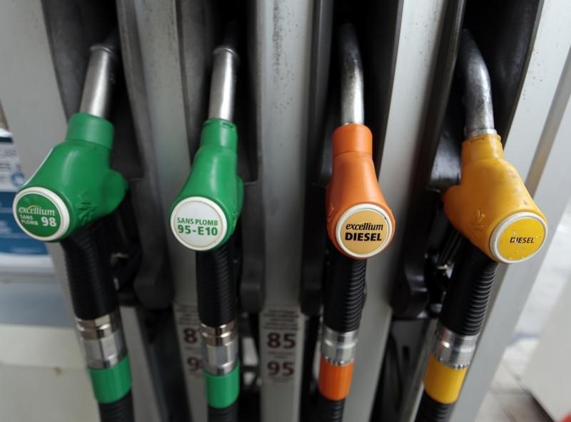 © Reuters. Petrol nozzles are seen in a gas station in Nice