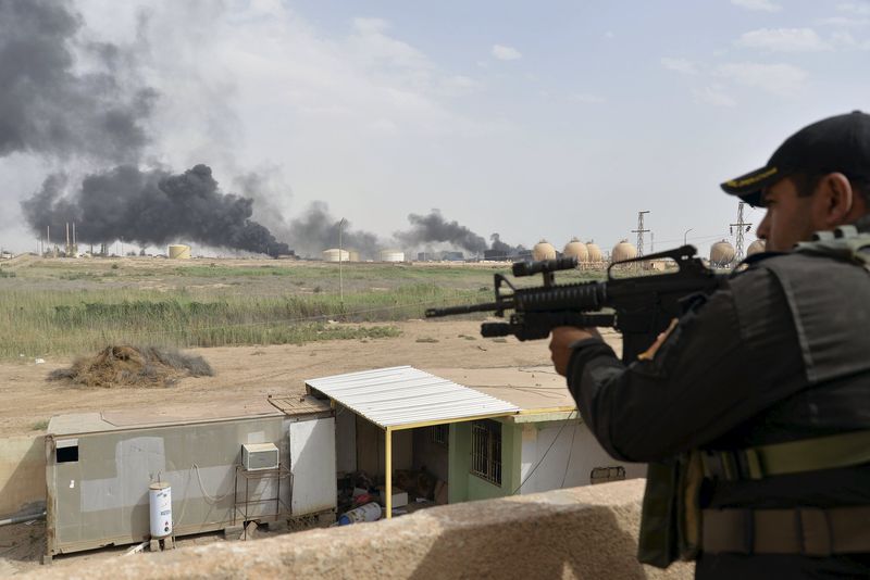 © Reuters. مسؤولون: أمريكا تعد خططا لاقامة قاعدة في العراق وإرسال مدربين