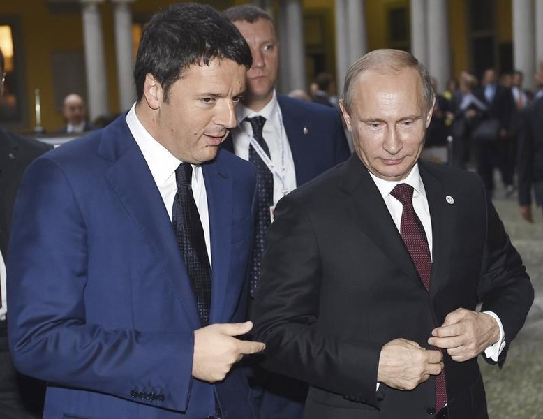 © Reuters. رئيس وزراء ايطاليا يرحب بالرئيس الروسي ويشير الى خلافات بين الجانبين