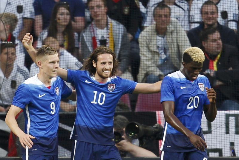 © Reuters. Diskerud of the U.S. celebrates with team mates Johannsson and Zardes after scoring a goal against Germany during their international friendly soccer match in Cologne