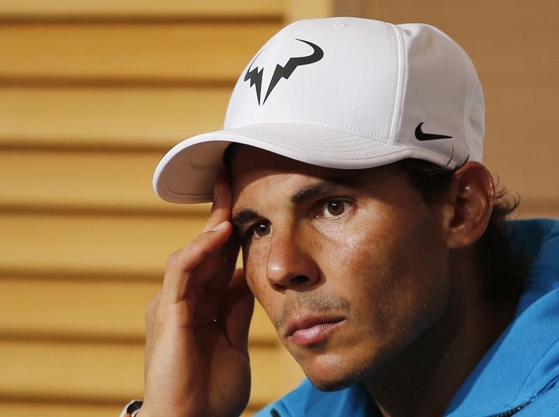 © Reuters. Rafael Nadal of Spain attends a news conference after being defeated by Novak Djokovic of Serbia during their men's quarter-final match at the French Open tennis tournament in Paris