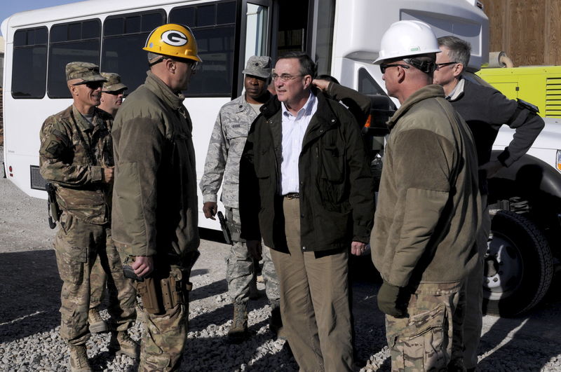 © Reuters. Handout photograph shows U.S. Defense Department Inspector General Rymer touring deconstruction site on Kandahar Airfield,  Afghanistan