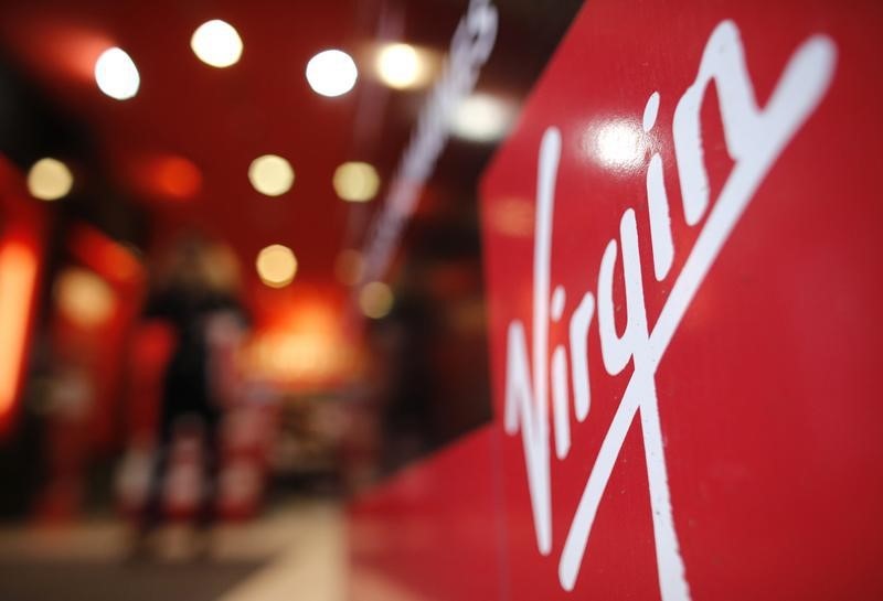 © Reuters. A logo is seen next to the entrance of the Virgin Megastore at the Champs Elysees in Paris