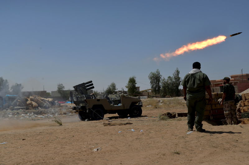 © Reuters. مقتل 17 في معارك قرب مصفاة بيجي العراقية